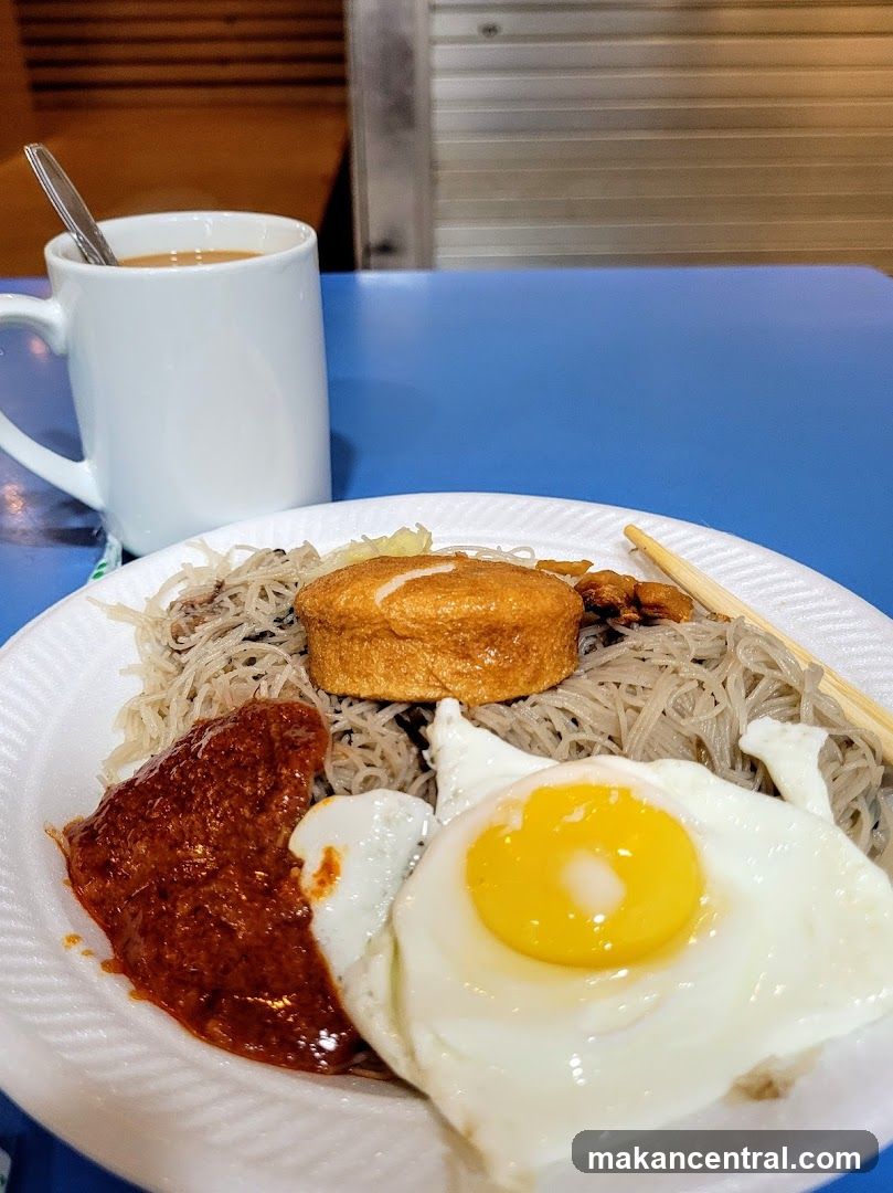 Fried Egg and Noodles with Fish Cake