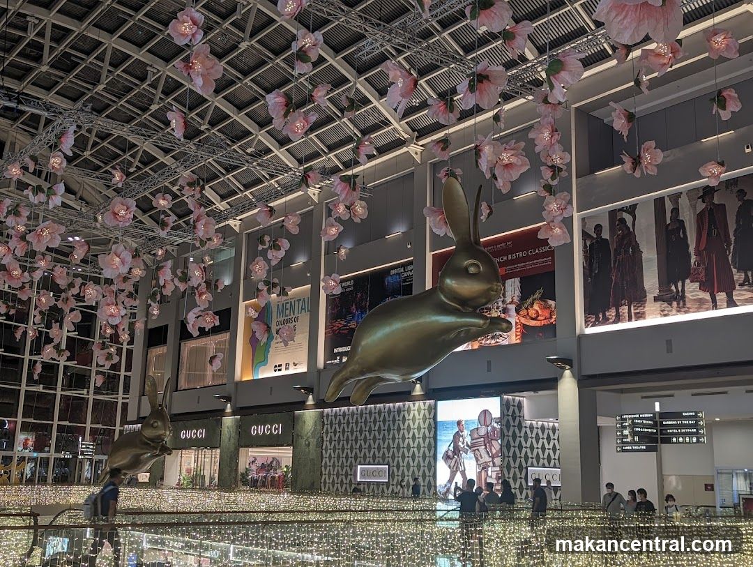 Mall Interior with Bunny Sculptures and Floral Decorations