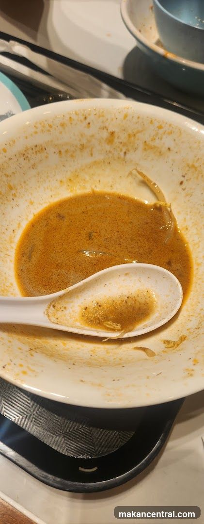 Dirty Bowl with Spoon