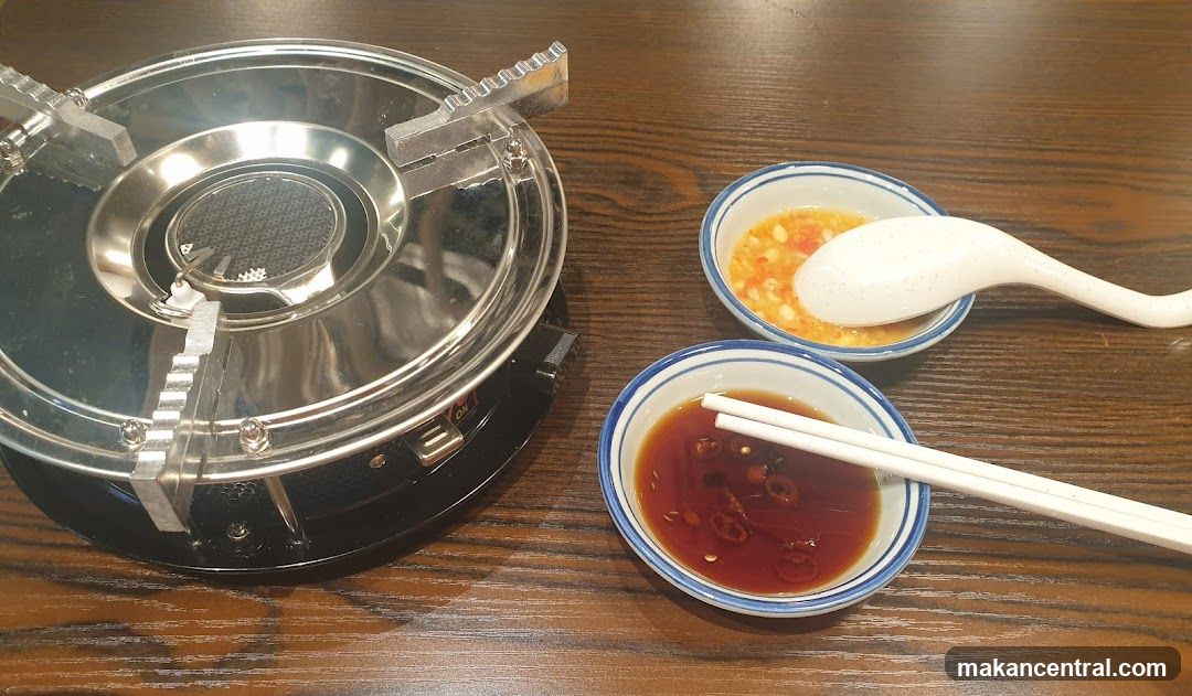 Table Setting with Portable Stove and Dipping Sauces