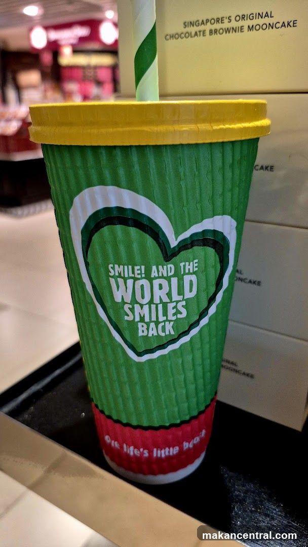 Green cup with inspirational quote