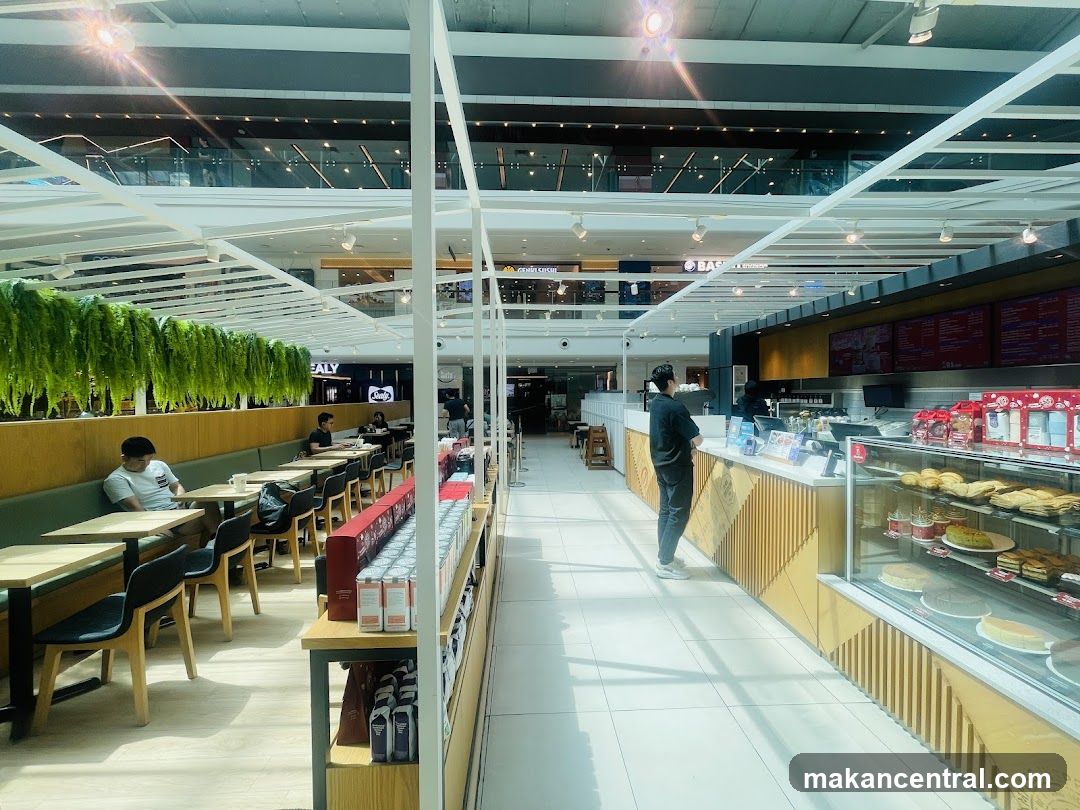 Cafe Interior with Seating and Display Counter