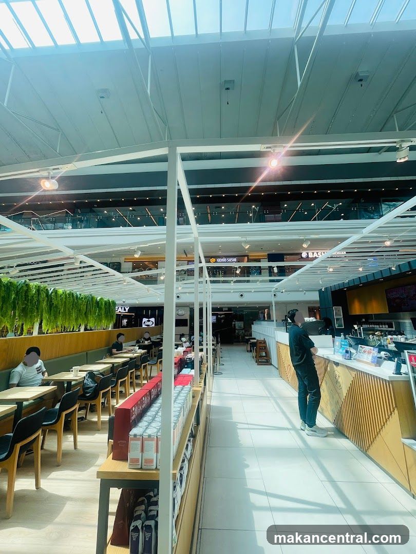 Indoor cafe with seating and merchandise