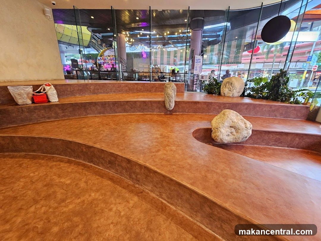 Tiered seating area with decorative rocks