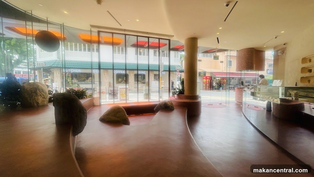 Interior of a cafe with a view of the street