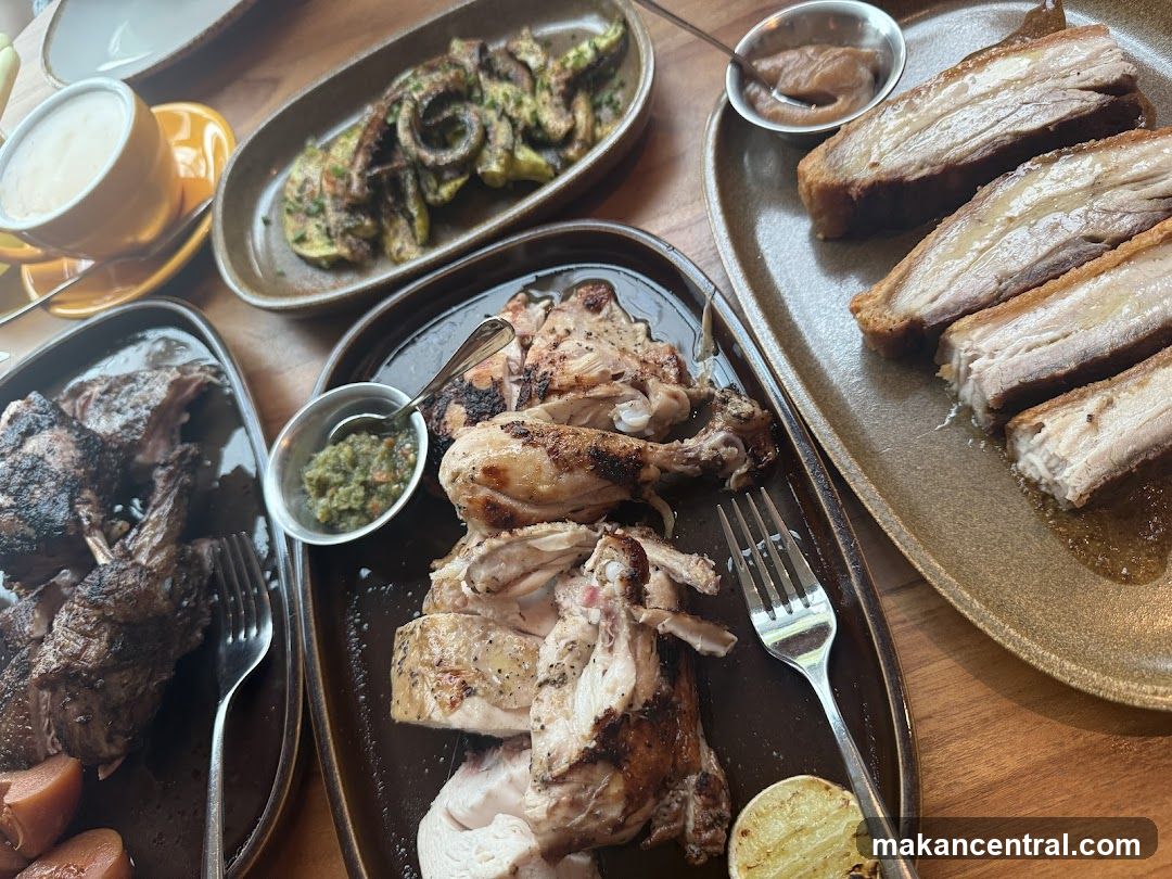 Assortment of Roasted Meats and Side Dishes