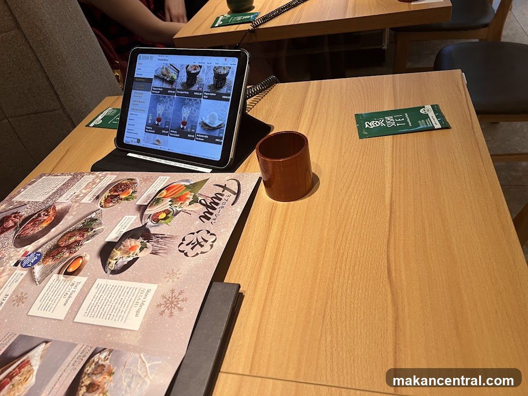 Table Setting with Menu and Tablet