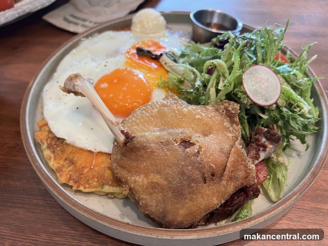 Duck Confit with Fried Eggs and Salad
