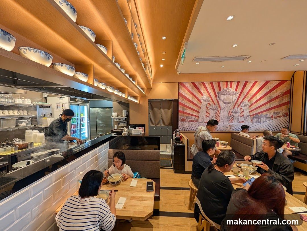 Restaurant Interior with Open Kitchen and Dining Area