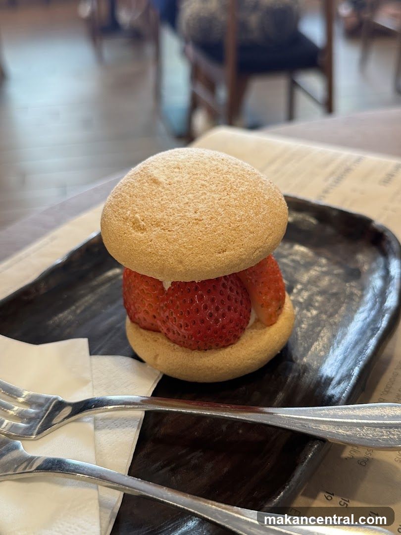 Strawberry dessert with powdered sugar
