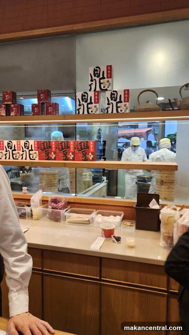 Restaurant Counter with Packaged Goods and Staff