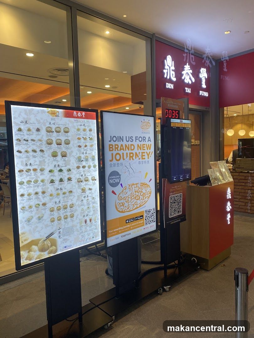 Din Tai Fung storefront with menu and promotional displays