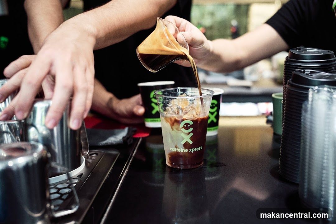 Barista preparing a coffee drink