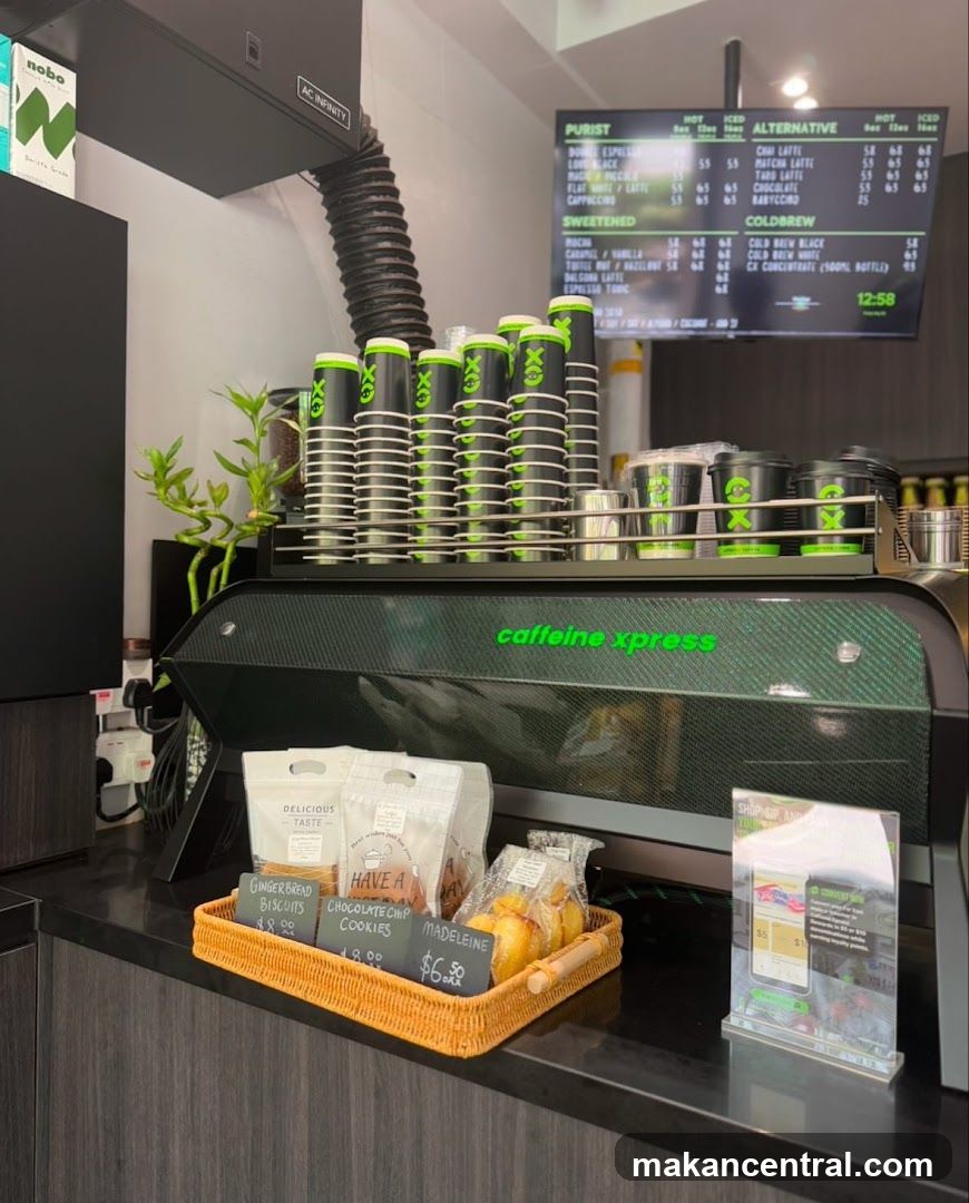 Coffee shop counter with menu and pastries
