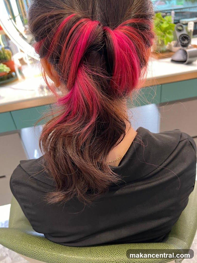 Woman with pink highlights in her hair