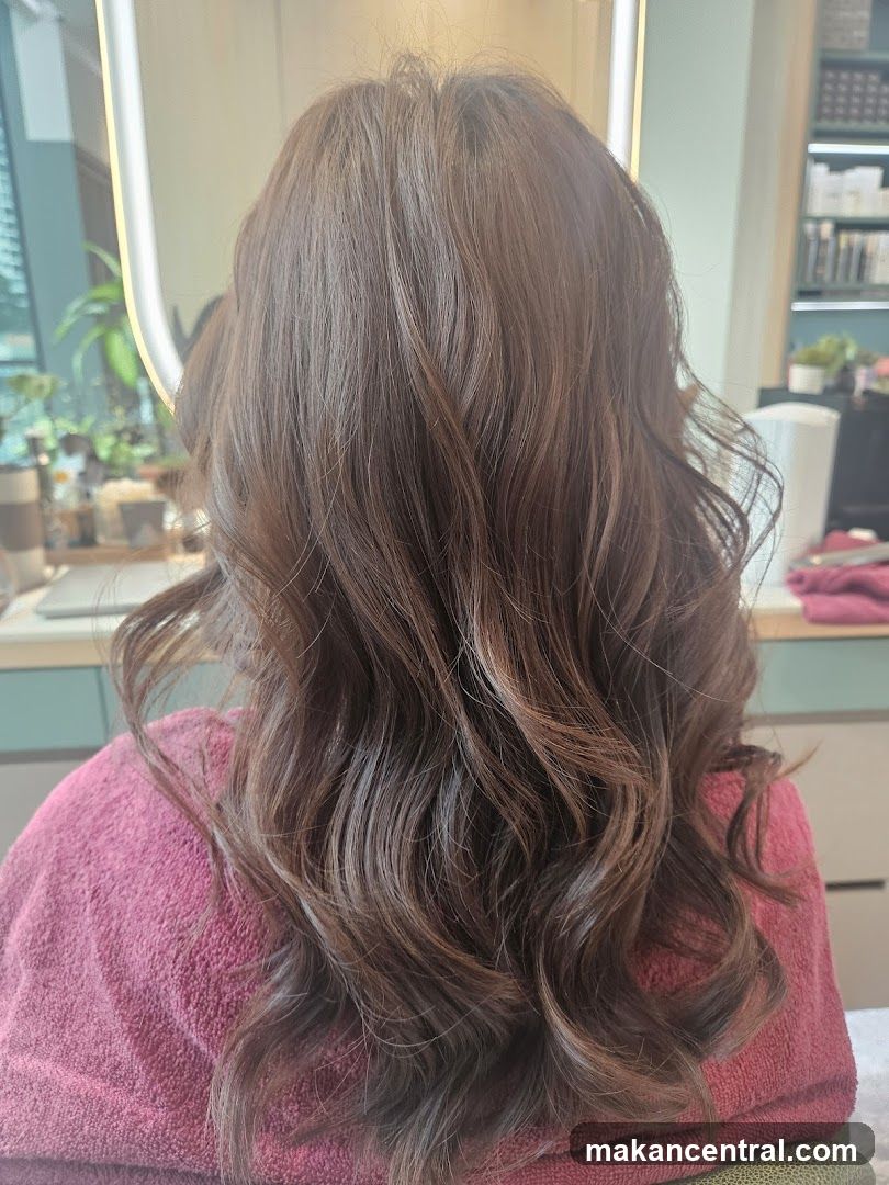 Woman's freshly styled brown hair