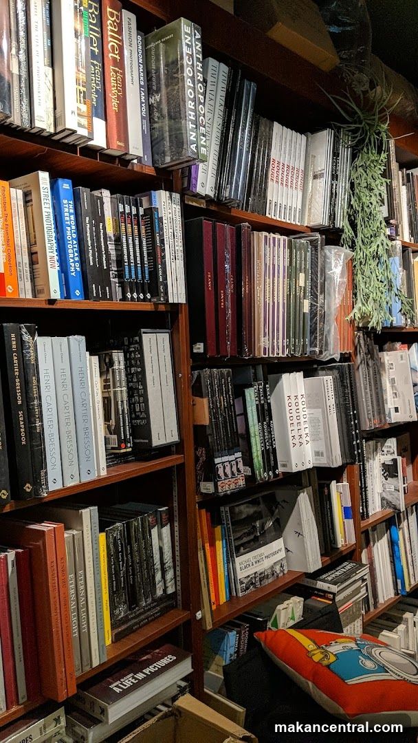 Bookshelves filled with photography books
