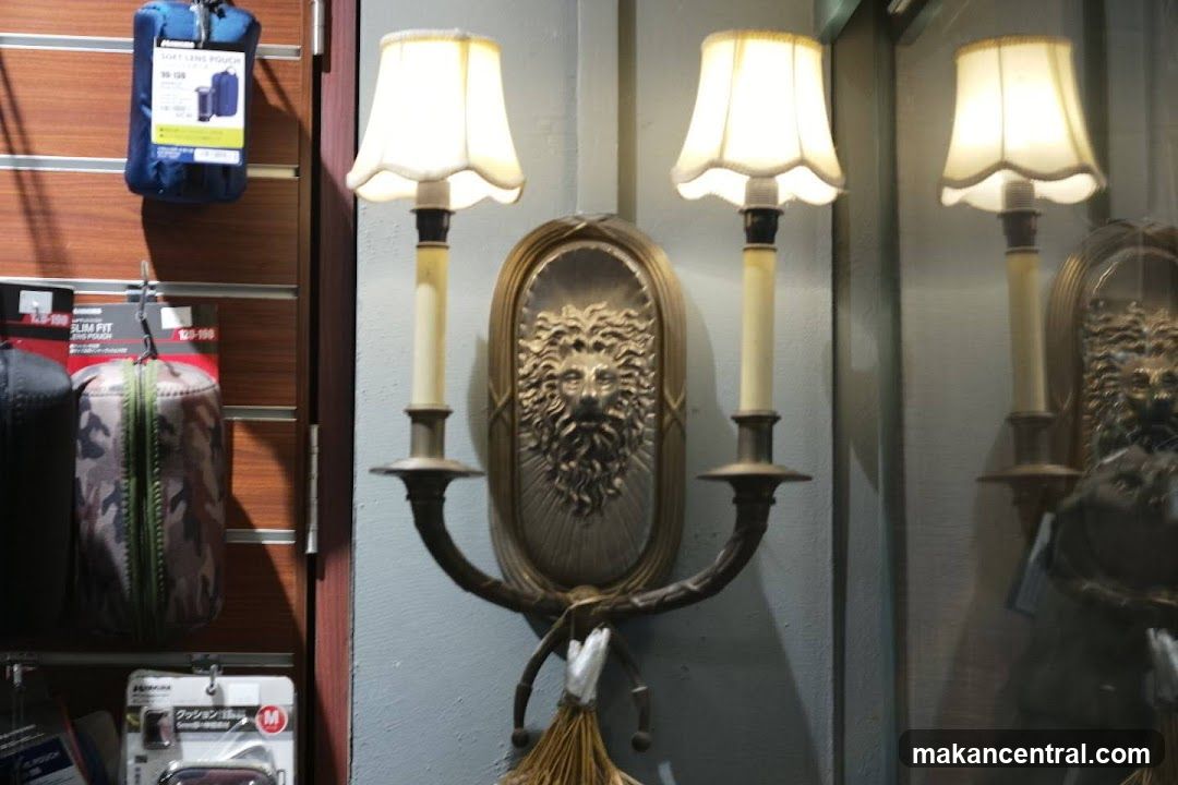 Wall Sconce with Lion Medallion