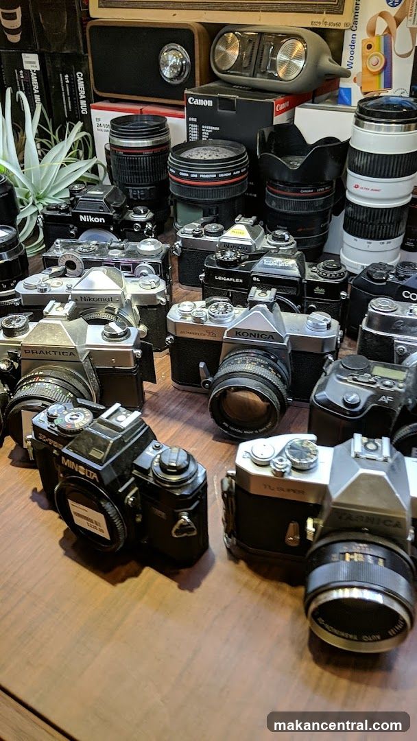 Collection of Vintage Cameras and Lenses