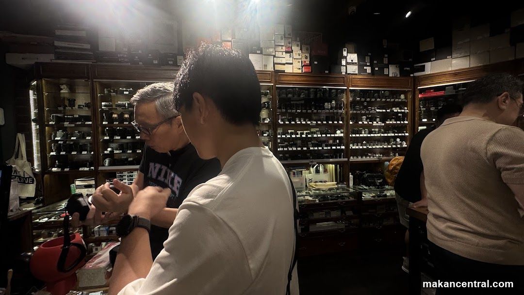 Customers browsing in a camera shop