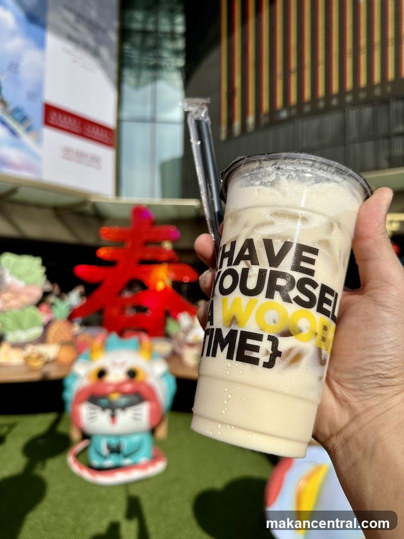 Drink with branded cup