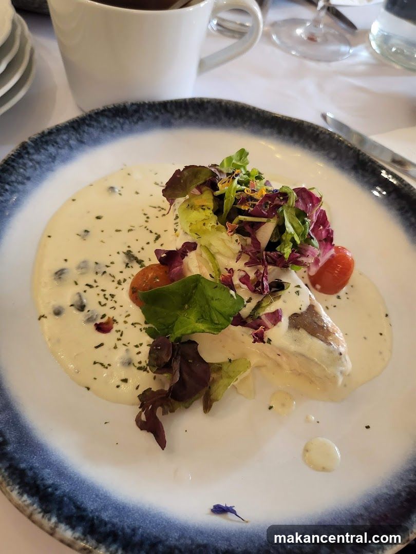 Fish dish with salad and sauce