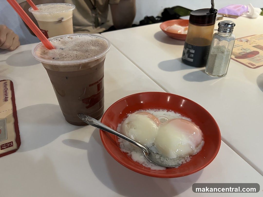 Table with drinks and soft-boiled eggs