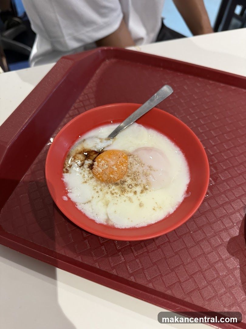 Soft-boiled eggs with soy sauce and pepper