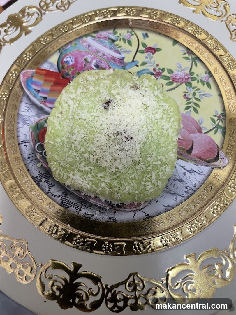 Green dessert with coconut flakes