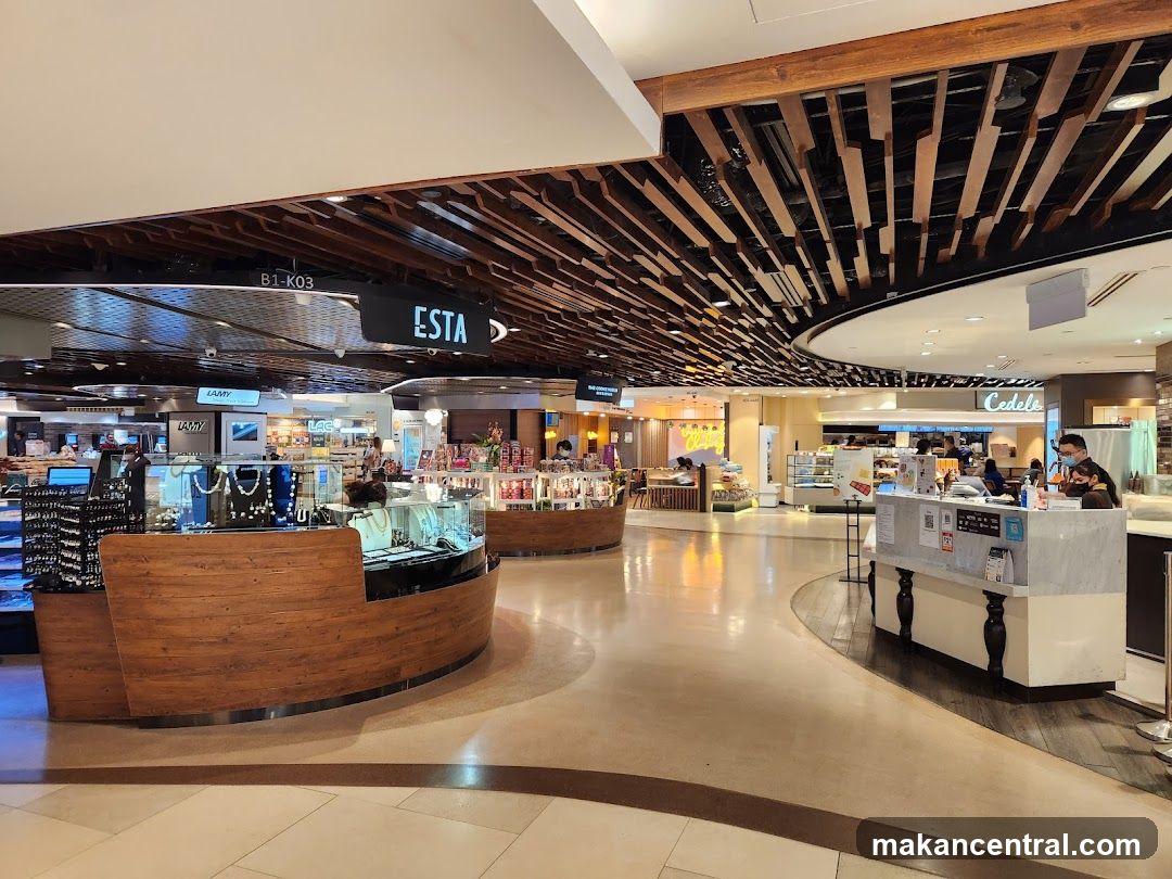 Interior of a shopping mall with various shops