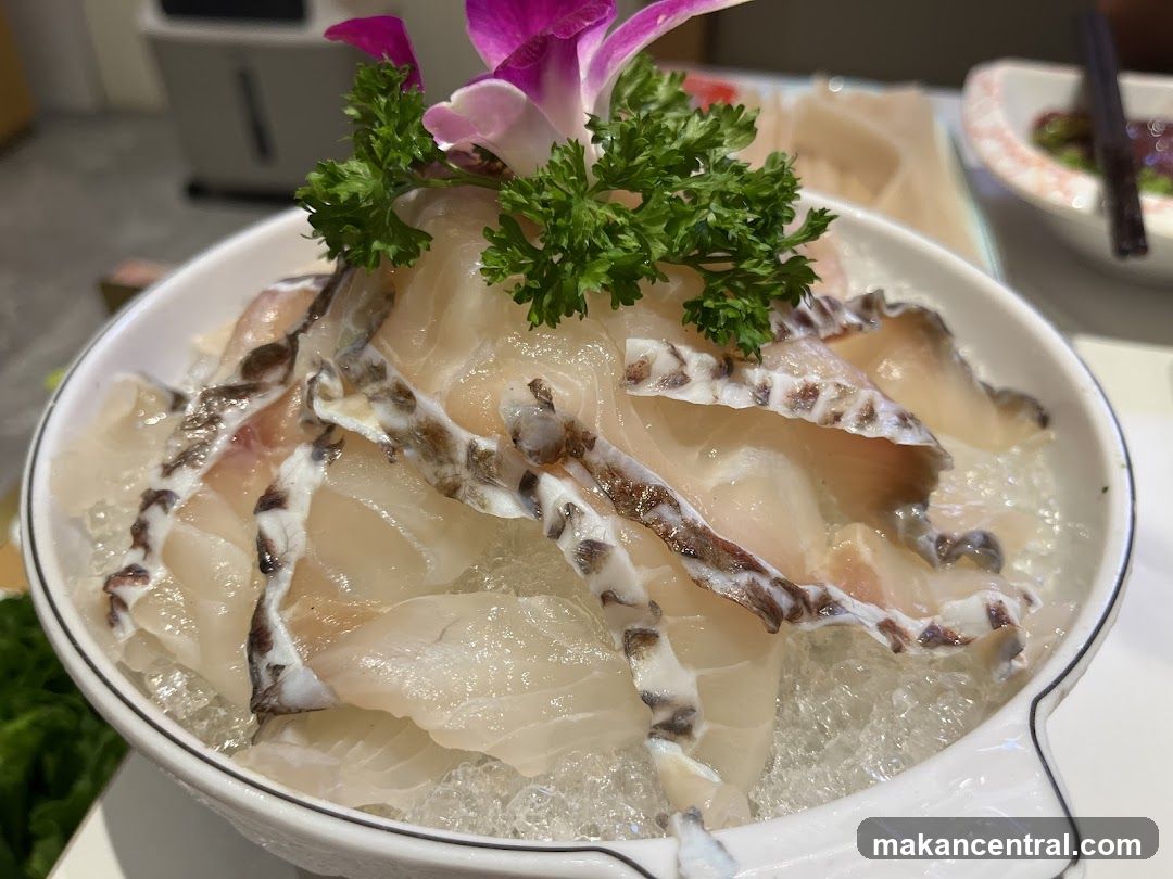 Thinly Sliced Fish on Ice