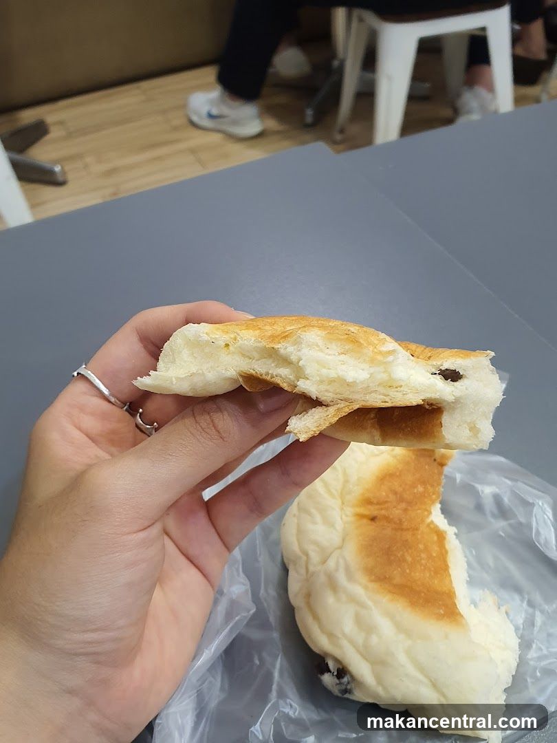 Person holding a pastry