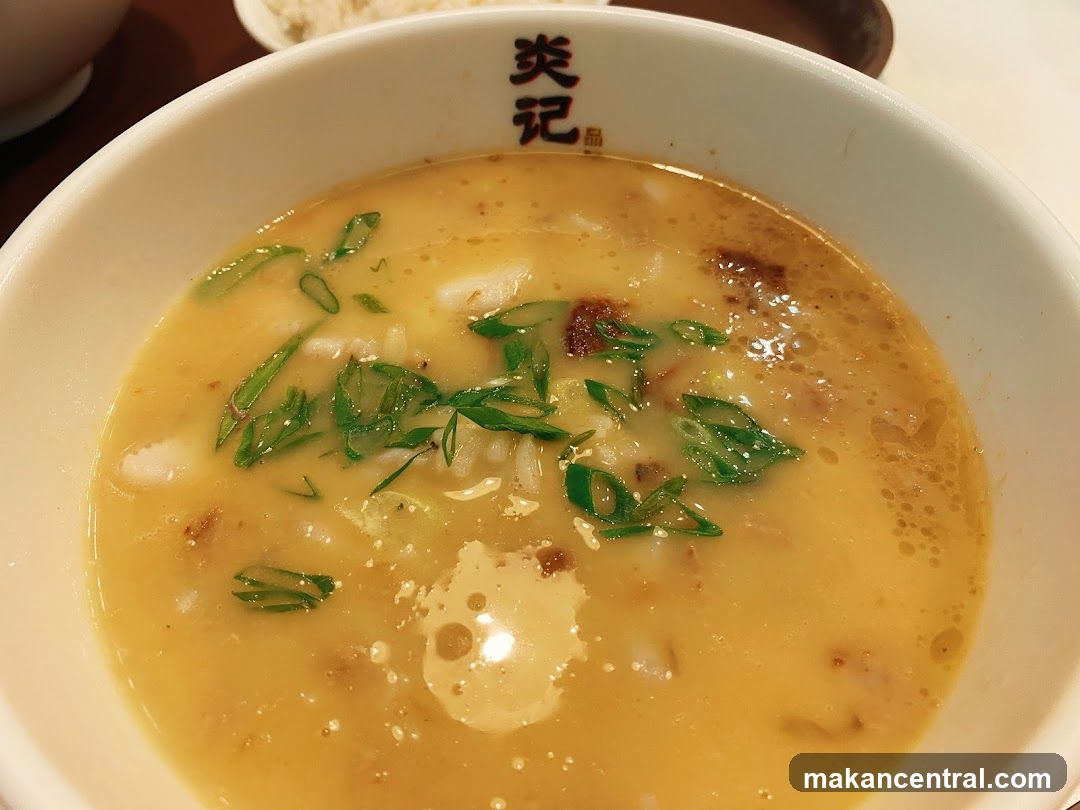 Bowl of Soup with Sliced Scallions