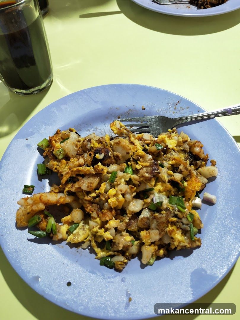Fried Carrot Cake with Scrambled Eggs and Spring Onions