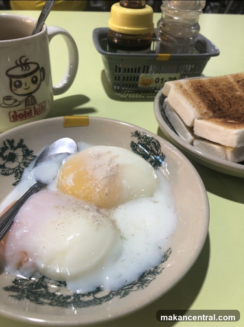 Soft-boiled eggs with toast and coffee