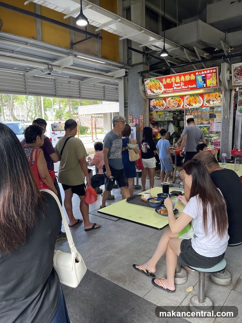 Busy Food Stall with Customers