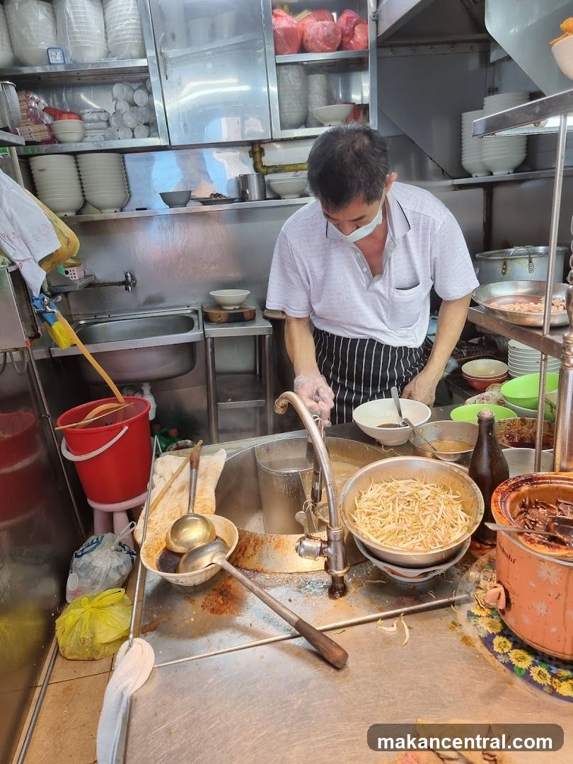 Cook preparing food in a kitchen