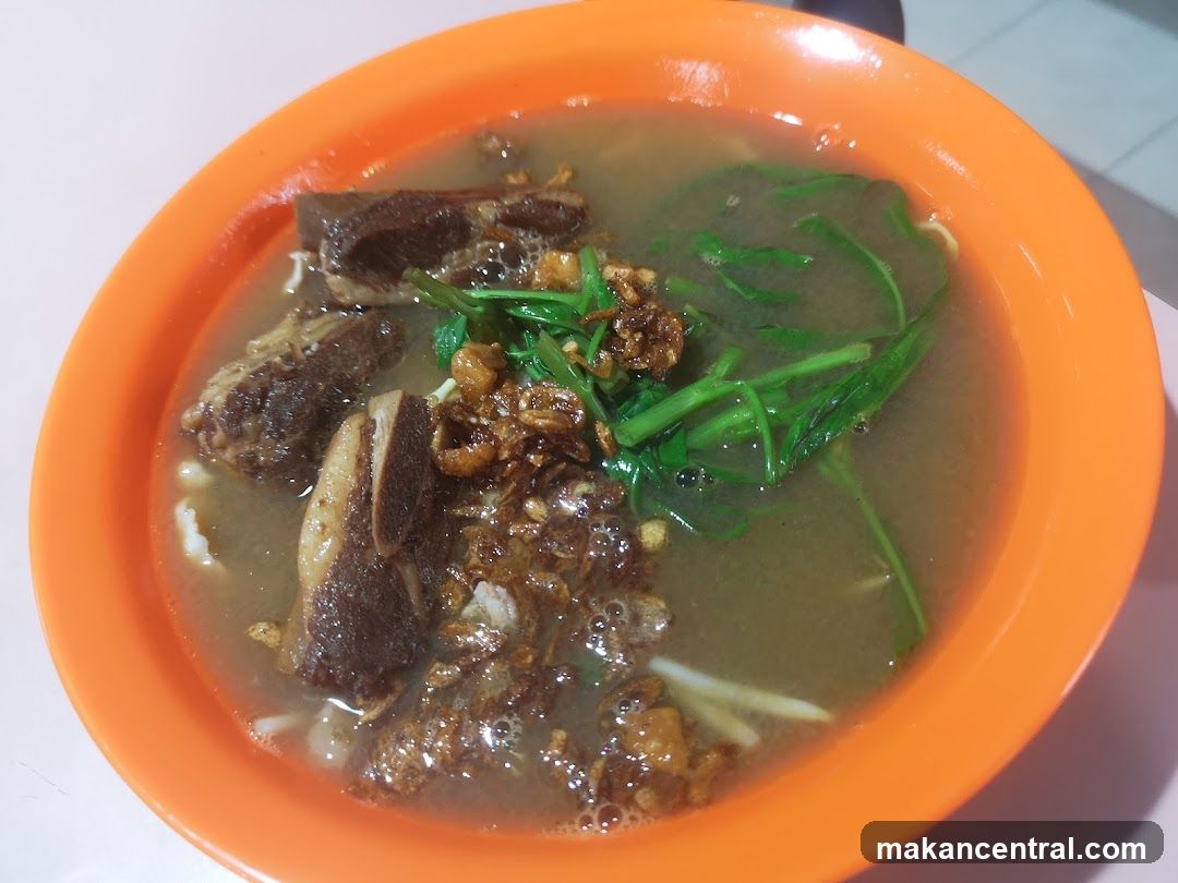 Bowl of Noodles with Meat and Greens
