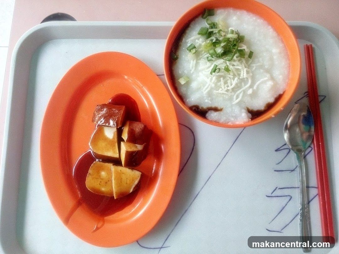 Congee with toppings and braised tofu