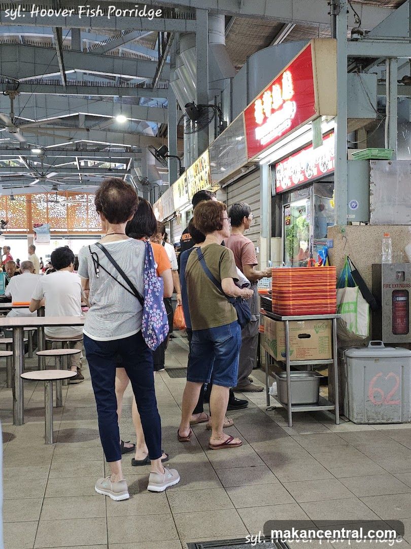 People queuing at a food stall