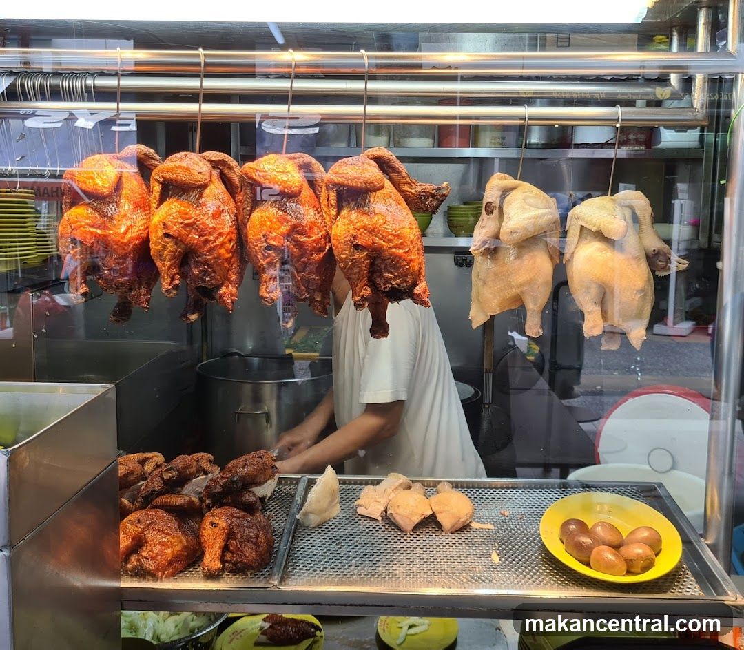 Hanging Chickens and Cooked Chicken