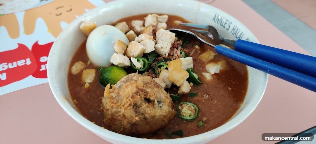 Bowl of Food with Utensils