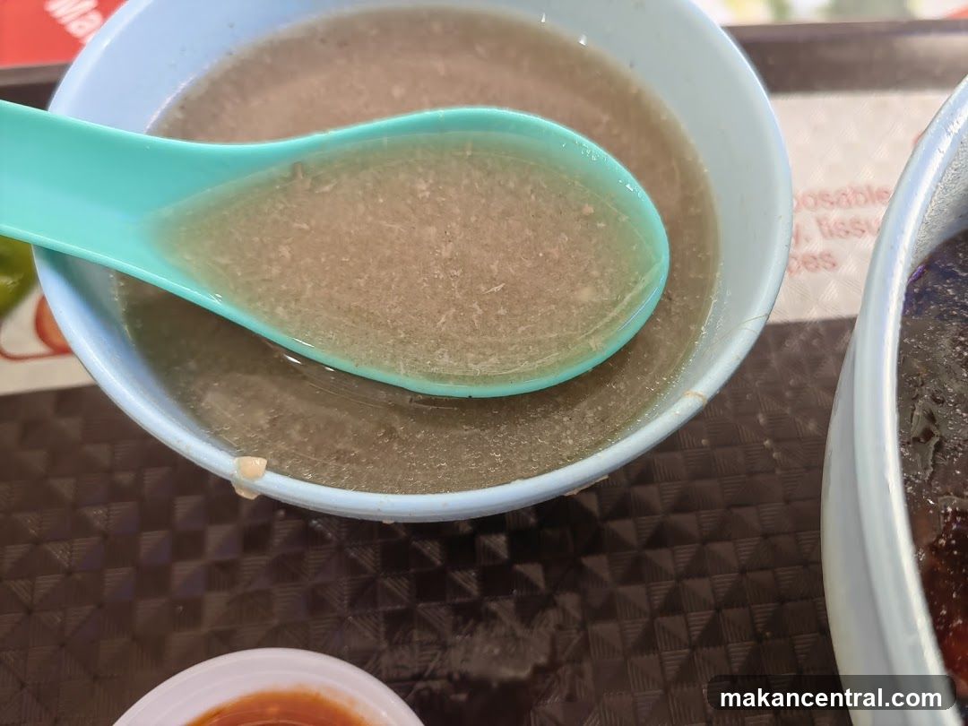 Bowl of Soup with Spoon