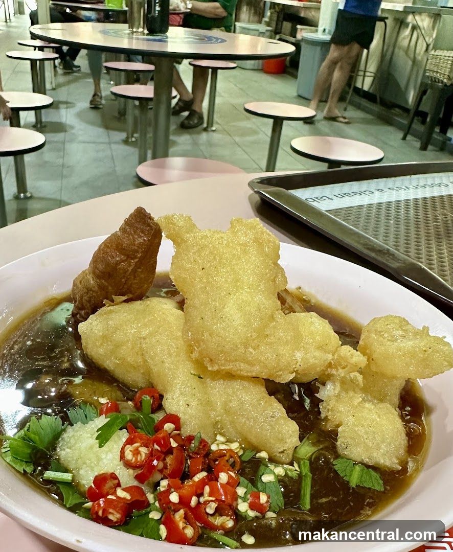 Fried Fish and Dough Fritters in Gravy