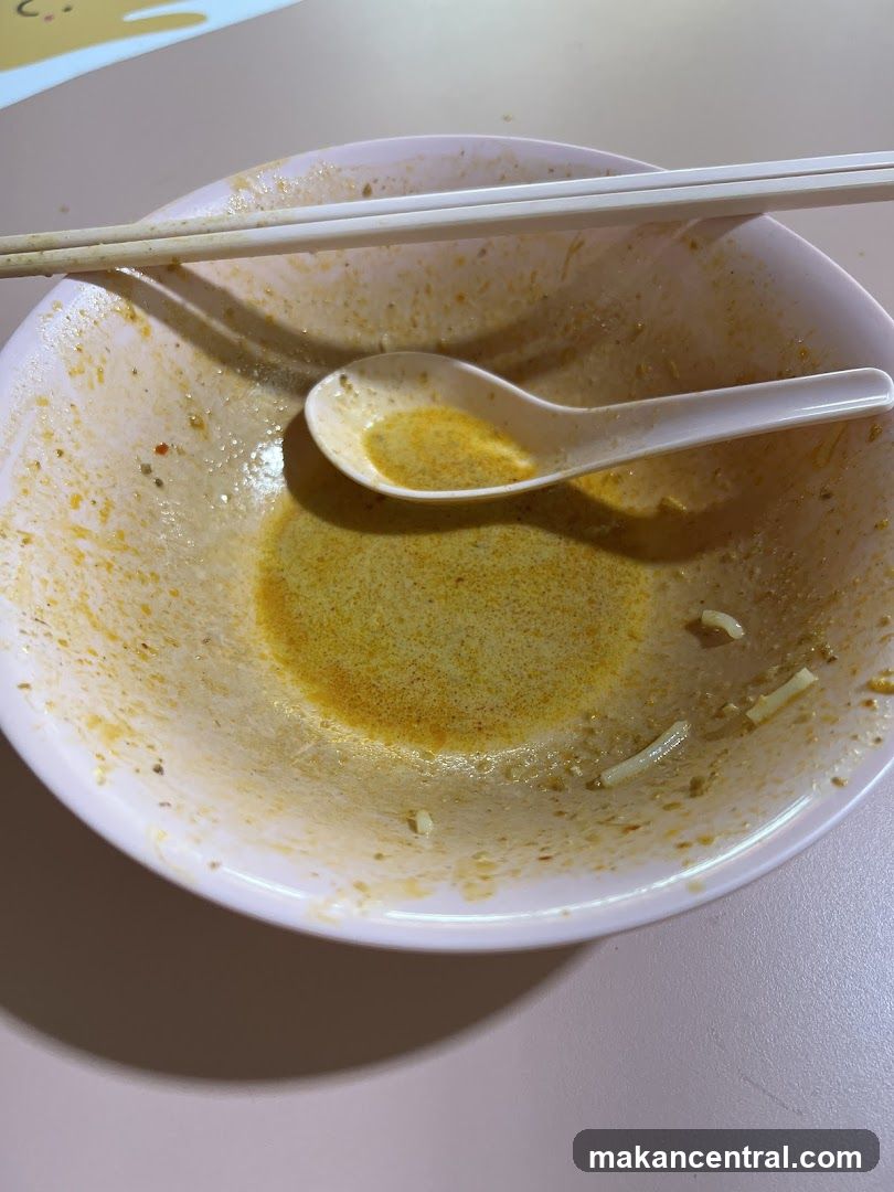 Dirty Bowl with Chopsticks and Spoon