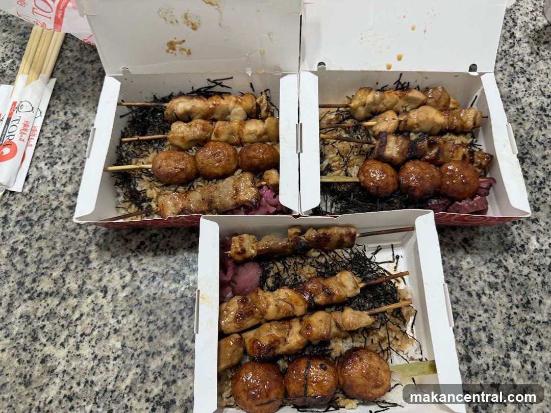 Three Takeout Boxes of Skewered Meats and Rice