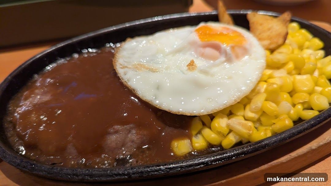 Hamburger Steak with Fried Egg and Corn