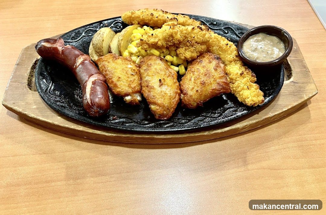 Sizzling Platter with Sausage, Chicken Wings, and Fries