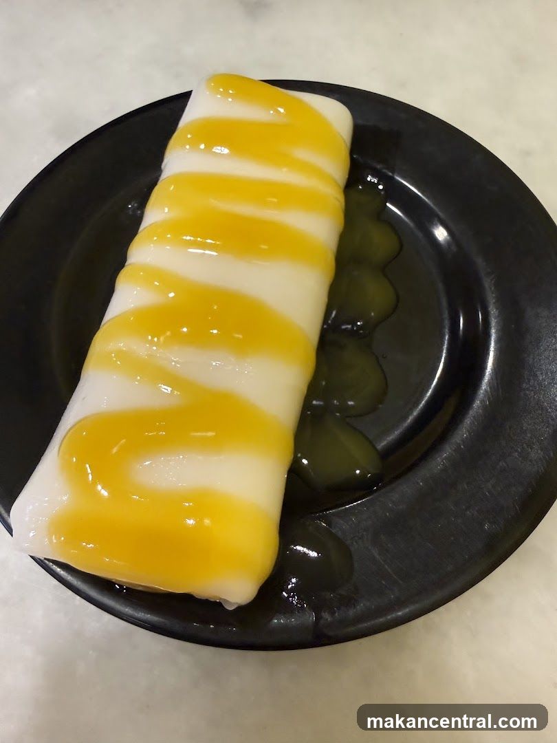 Dessert Roll with Yellow Sauce