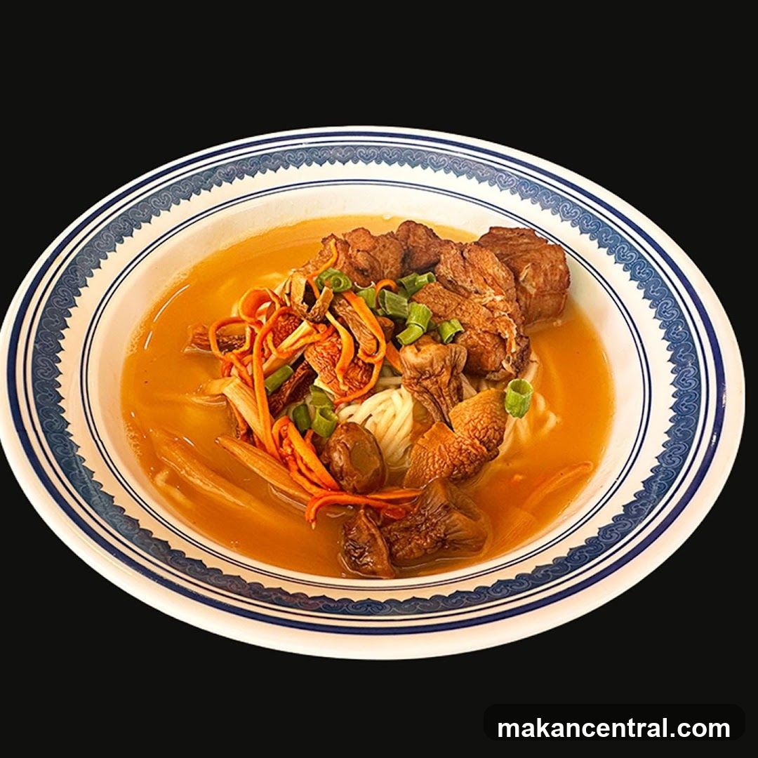 Bowl of Noodles with Meat and Vegetables
